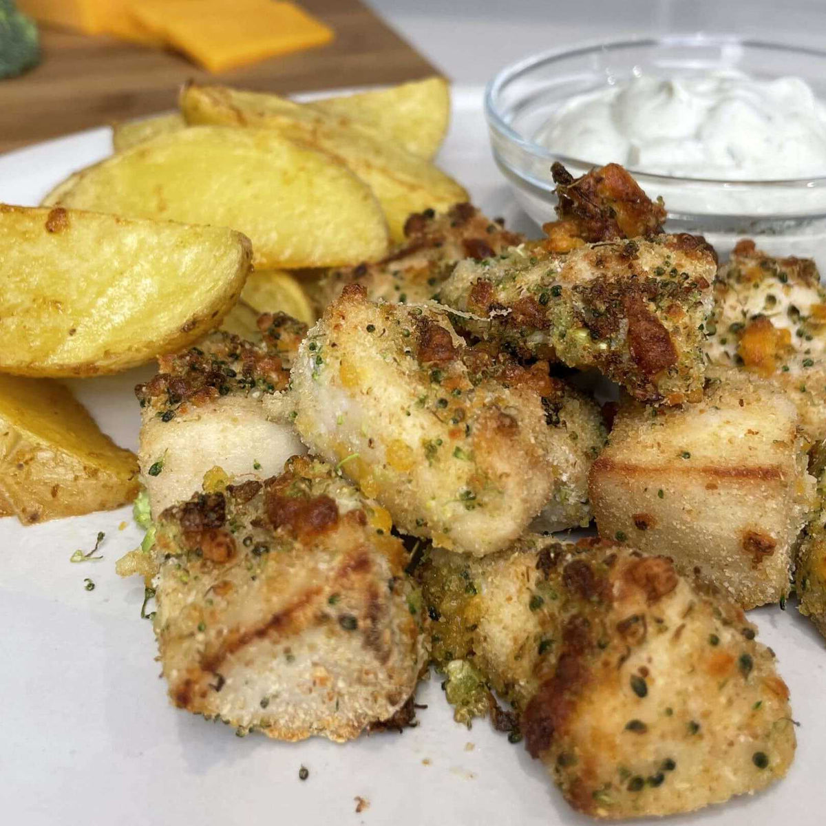 Broccoli Cheddar Chicken Nuggets with Seasoned Potato Wedges and Yogurt Ranch Dipper