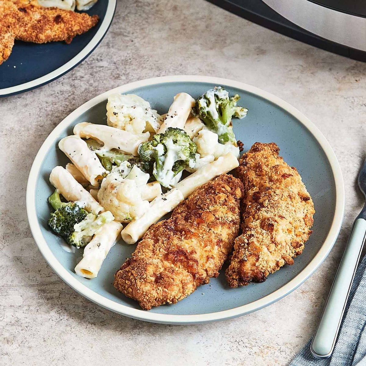Butter Cracker Chicken Tenders With Creamy Pasta, Broccoli, and Cauliflower