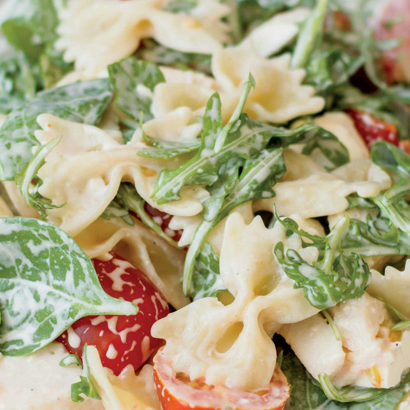 Chicken Breast with Spinach, Tomatoes, & Pesto Cream Farfalle