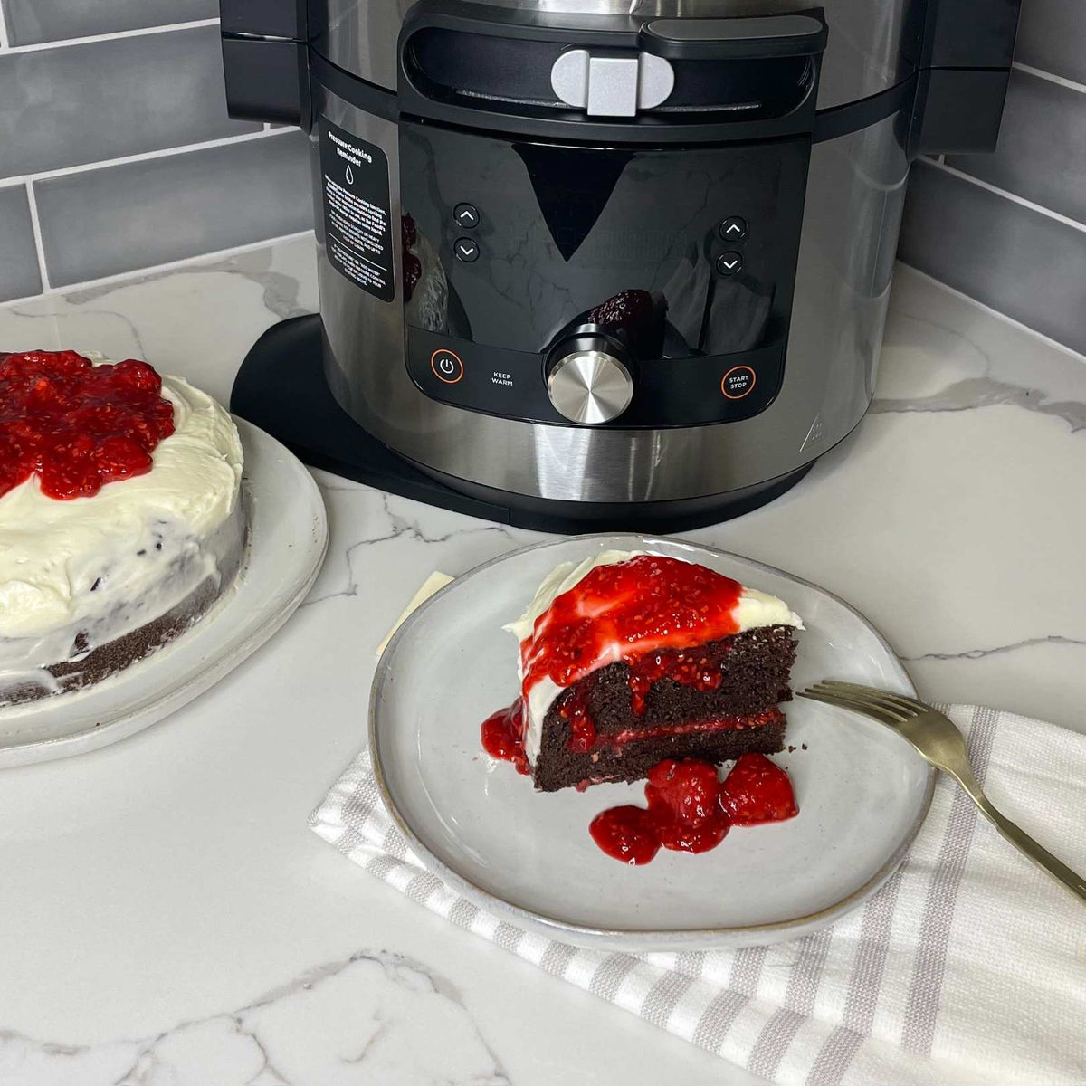 Chocolate Cake with Raspberry Filling and Orange Zest Frosting