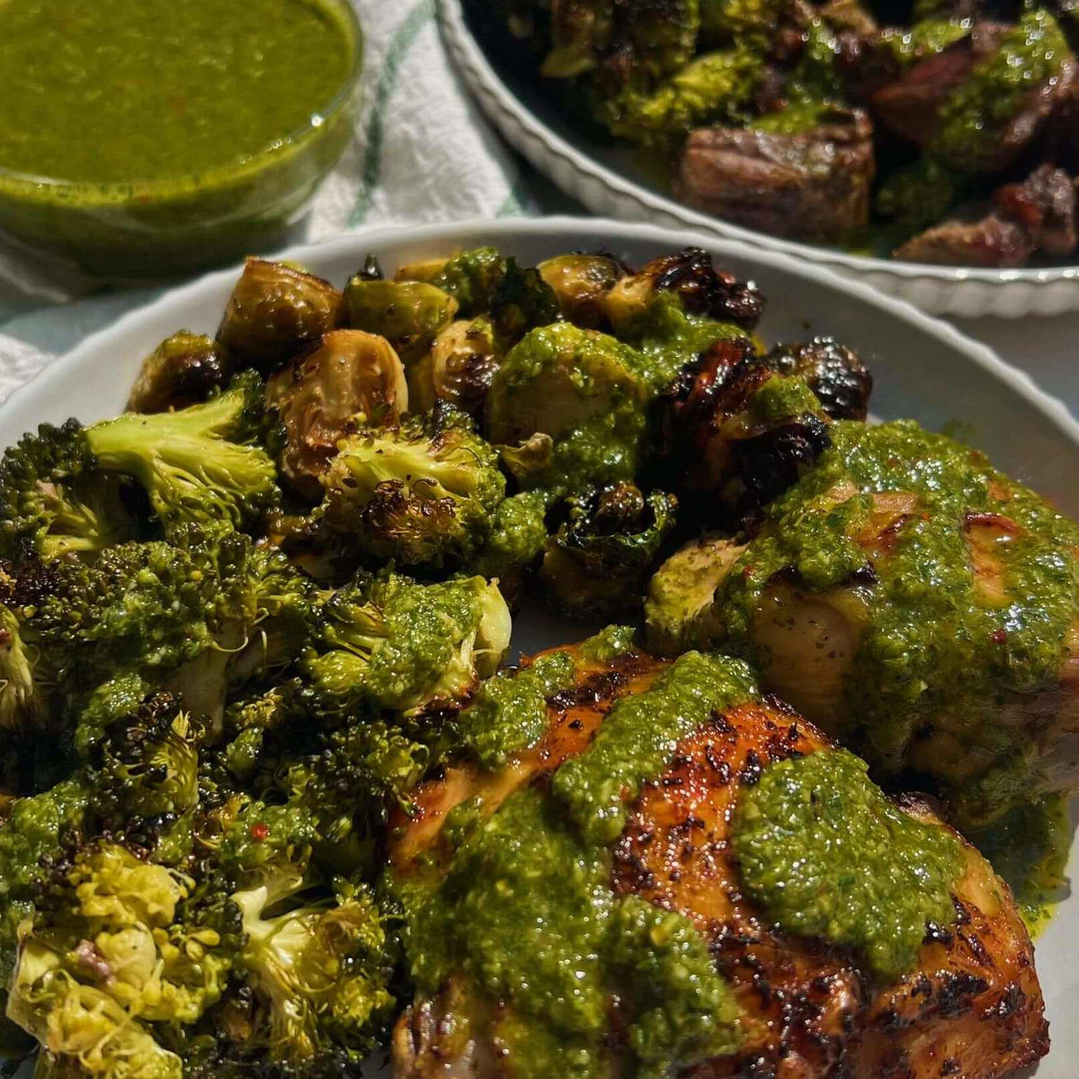 Graza® Chimichurri BUTCHERBOX® Steak Tips & Chicken Thighs with Garlic Broccoli and Honey glazed Brussels Sprouts