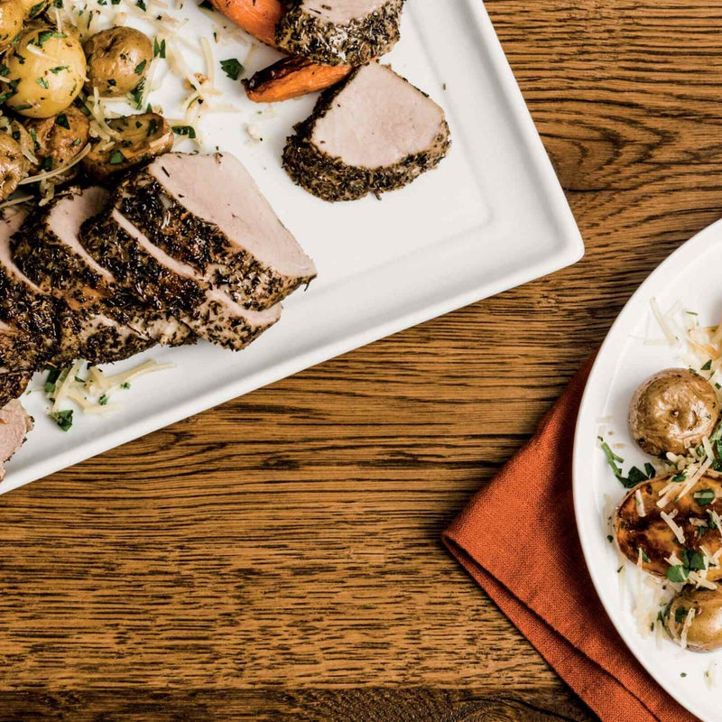 Herbed Pork Tenderloin with Roasted Carrots and Parmesan Baby Potatoes
