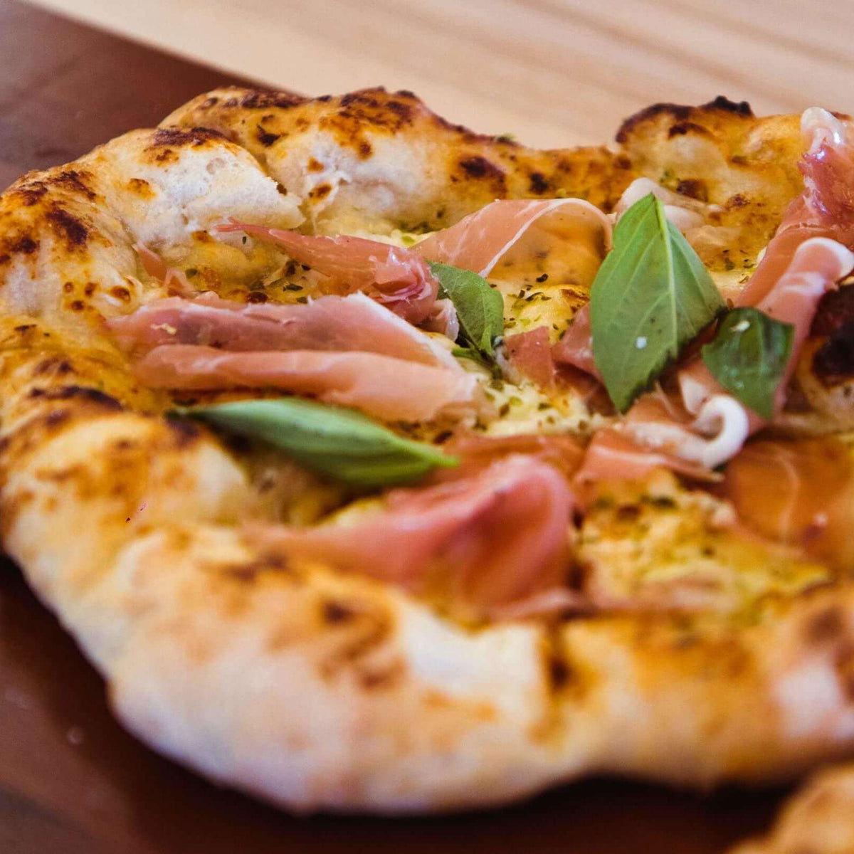 Prosciutto and Arugula Deep Dish Pizza
