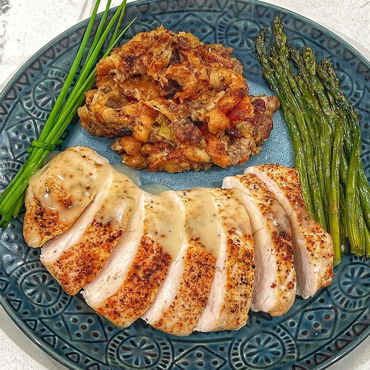 Turkey Tenderloin with Holiday Stuffing and Asparagus
